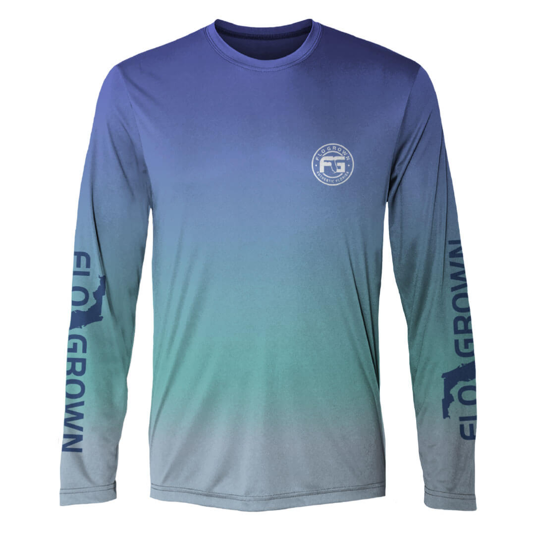 A long-sleeved performance tee with gradient color shading from blue to green, featuring FloGrown logos on both sleeves