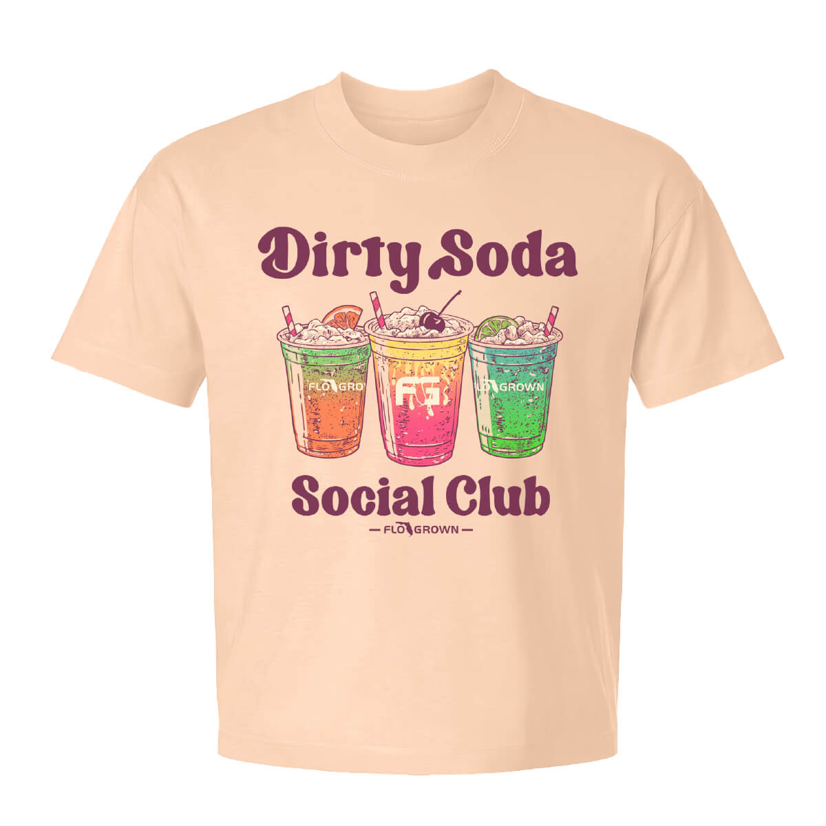 Light peach women's tee with a graphic of different sodas on the front with the text 'Dirty Soda Social Club'.