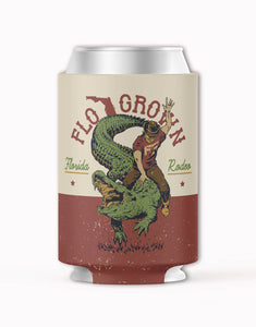 Can cooler with a graphic design of a person riding a alligator and 'FLOGROWN'  on a beige and red background