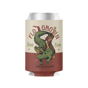 Can cooler with graphic design of person riding an alligator and text on a white background