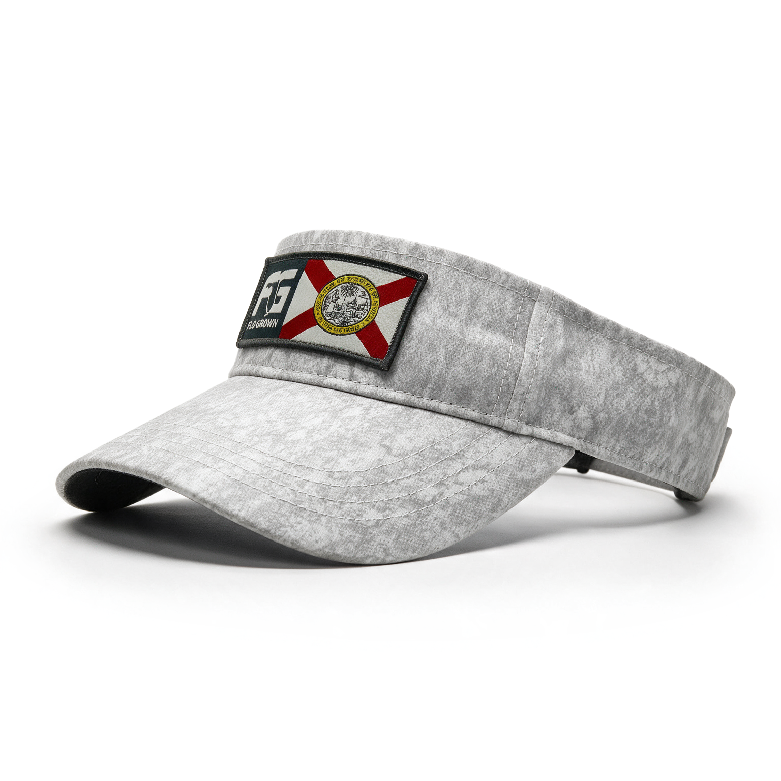 A light gray textured visor hat featuring a rectangular patch on the front with the Florida state flag and a central seal, shown on a white background.