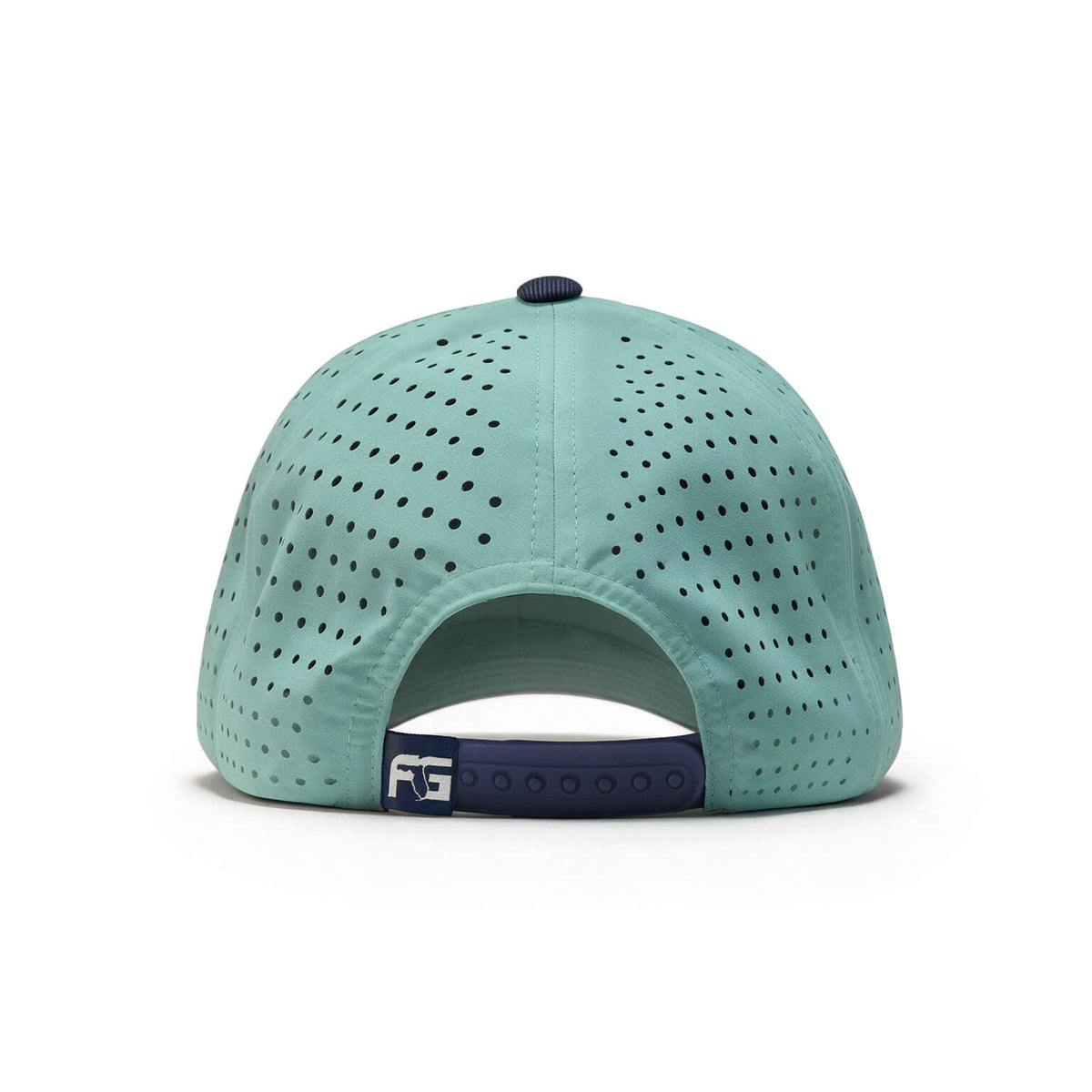 A mint green perforated baseball cap shown from the back, featuring a dark navy blue button on top and an adjustable navy blue strap with a small white logo.