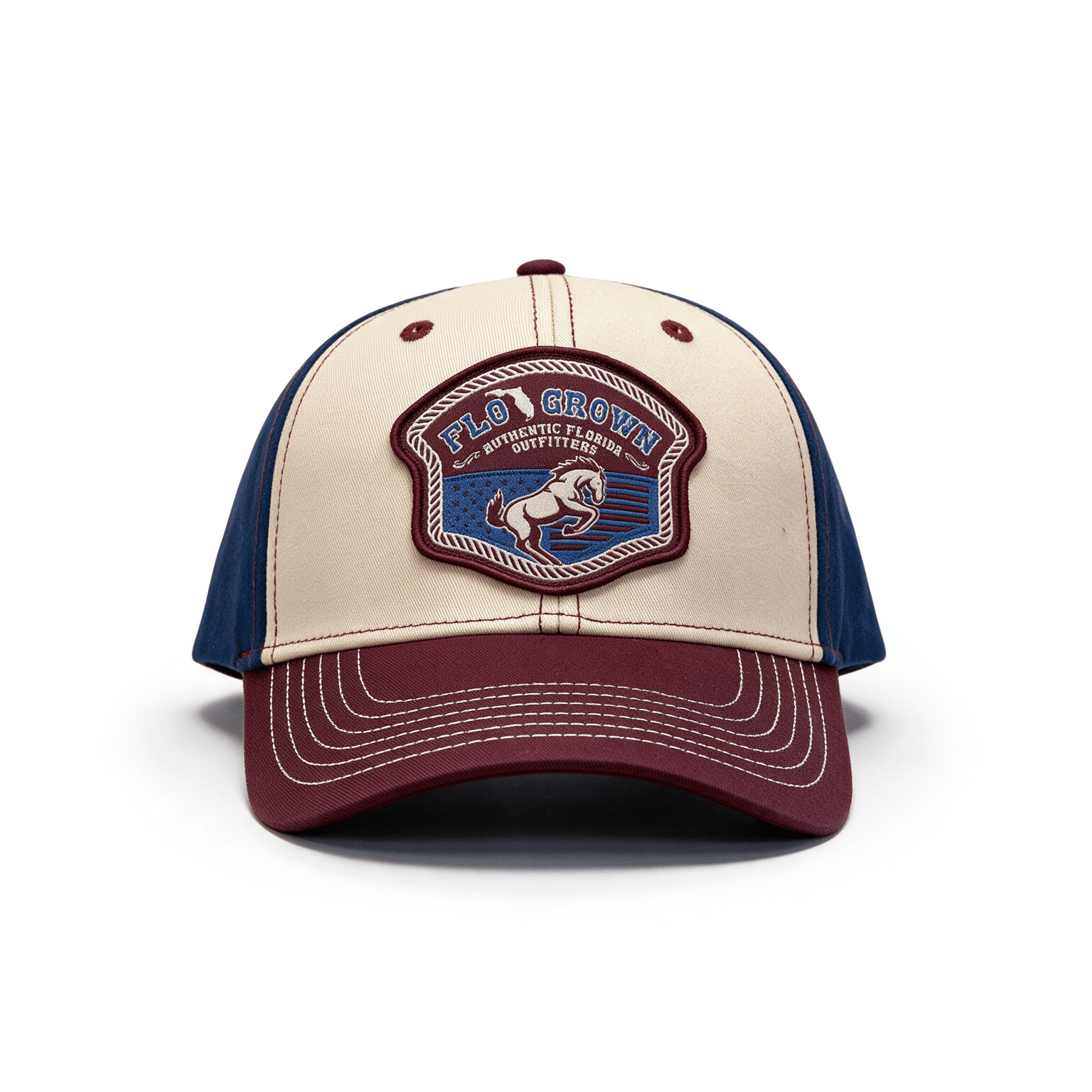 Full front view showing the crown with patch and red brim.