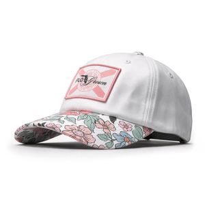 White cap with floral brim and pink and black Florida flag embroidered on the crown with the FloGrown logo over it.