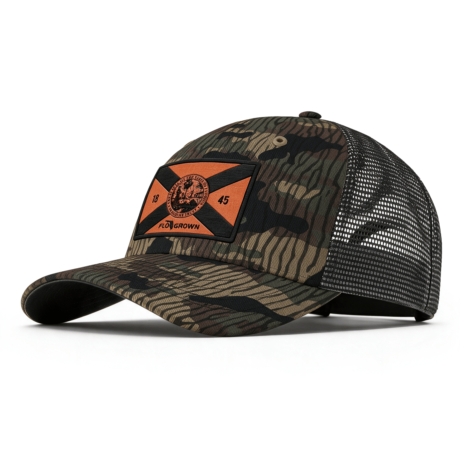 A camouflage trucker hat with a black mesh back and a front patch featuring an orange and black Florida flag with the text 'FLOGROWN'.