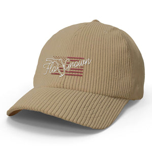 Tan hat with a Florida flag embroidered and the FloGrown logo in a script text.