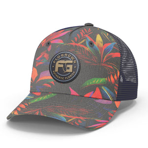 Trucker hat with colorful leaf pattern and rubber FloGrown logo patch on the crown.