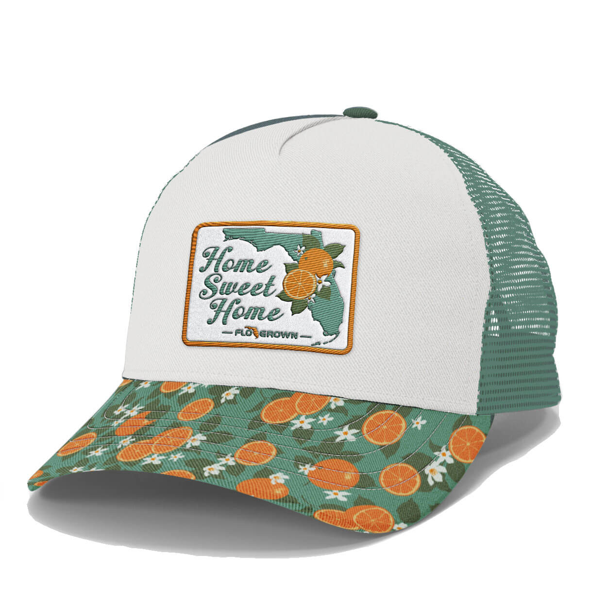 Trucker hat with floral and orange design on the visor with a white crown and a patch that says "Home Sweet Home".