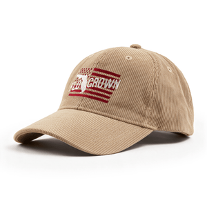 Tan hat with a Florida flag embroidered and the FloGrown logo in a script text.
