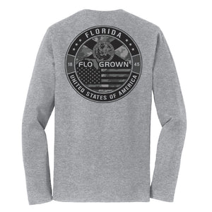 Heather gray long sleeve with a graphic of a circle crest with the Florida and American flag within.