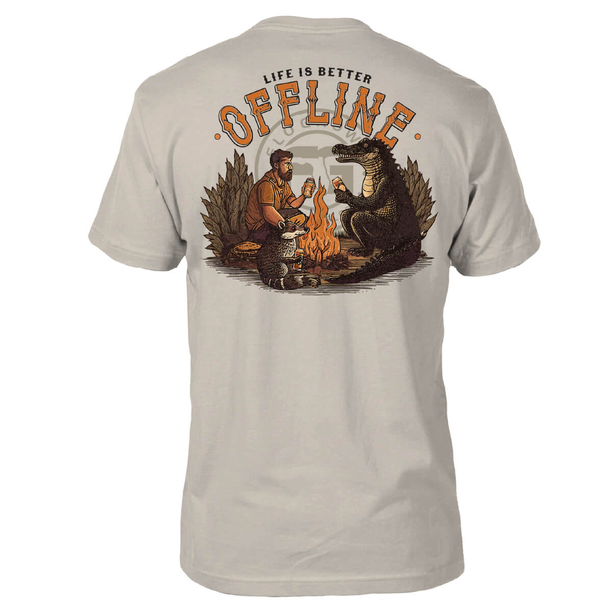 Beige shirt with a graphic of a man having a drink with an alligator and raccoon around a campfire.