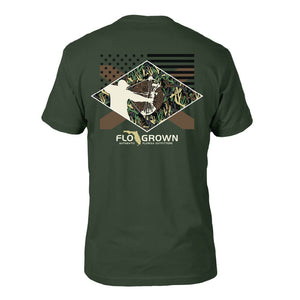 Green shirt with a graphic of a hunter drawing a bow in the woods over the Florida and American flags.