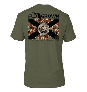 Green shirt featuring a camouflage Florida flag on the back.