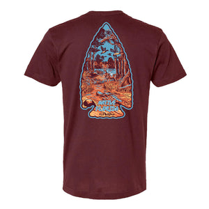 Maroon tee with a graphic of a swamp scene in the shape of an arrowhead on the back.