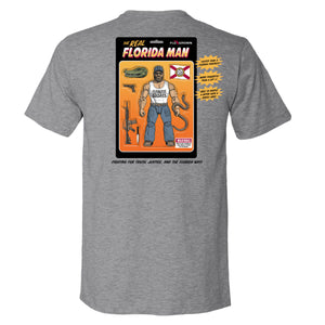 Heather gray tee with a graphic of the action figure of the Florida man with a python, gator head, pistol, rifle, and Florida flag.