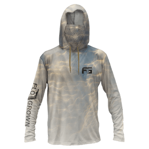 Hooded performance tee with a pattern of a sunset through clouds.