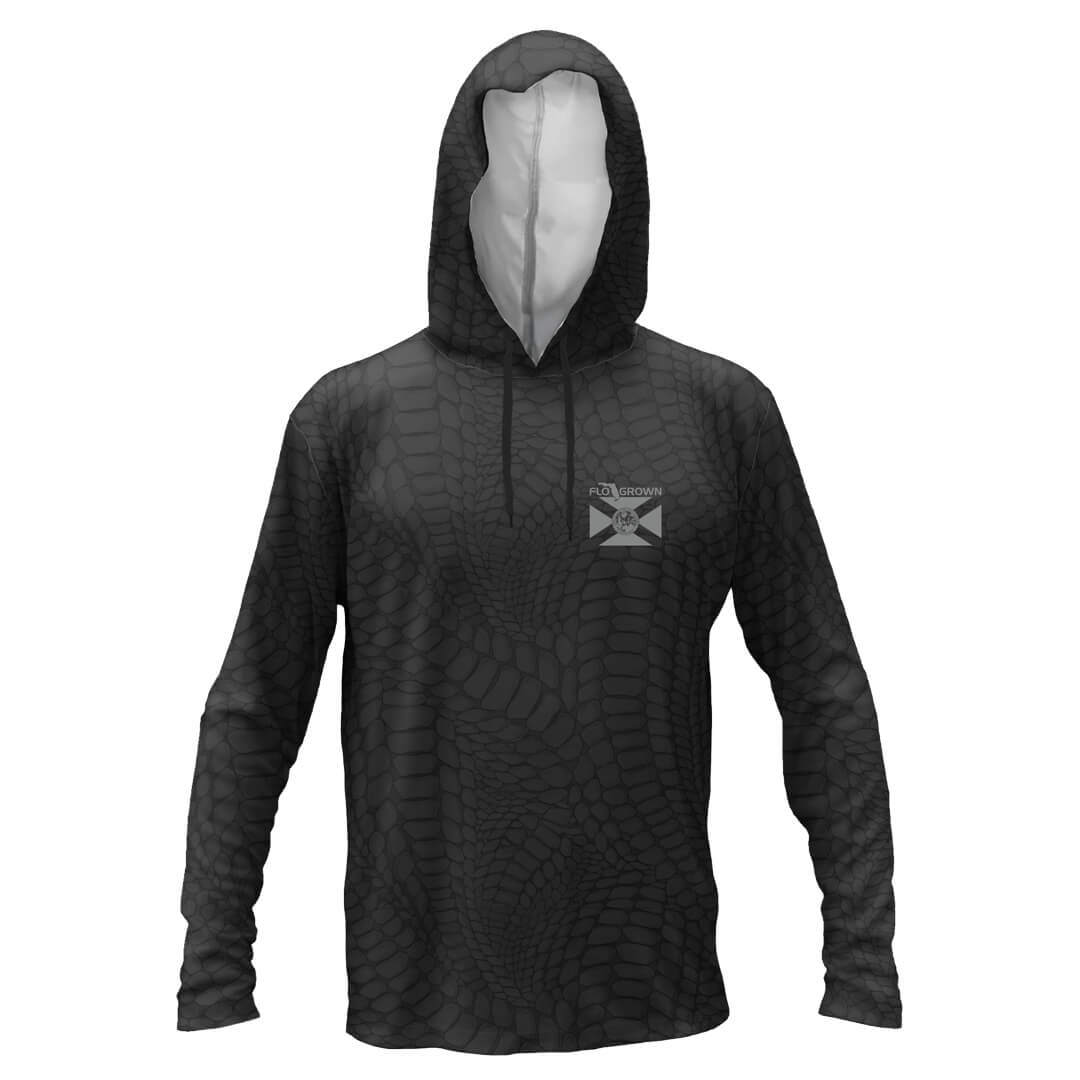 Black long sleeve performance tee with a hood and a gator skin pattern all over it with the Florida flag on the left chest.
