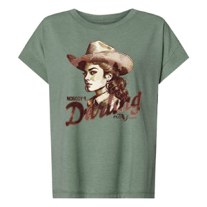Green t-shirt with a graphic of a woman in a cowboy hat and the text 'Nobody's Darling'.