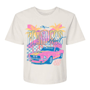 White womens tee with a vintage graphic of a car and checkered flag with a Florida flag and palm trees and the text 'FEARLESS HEART'.