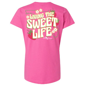 Pink womens tee with retro text 'LIVING THE SWEET LIFE' and graphics of strawberries.