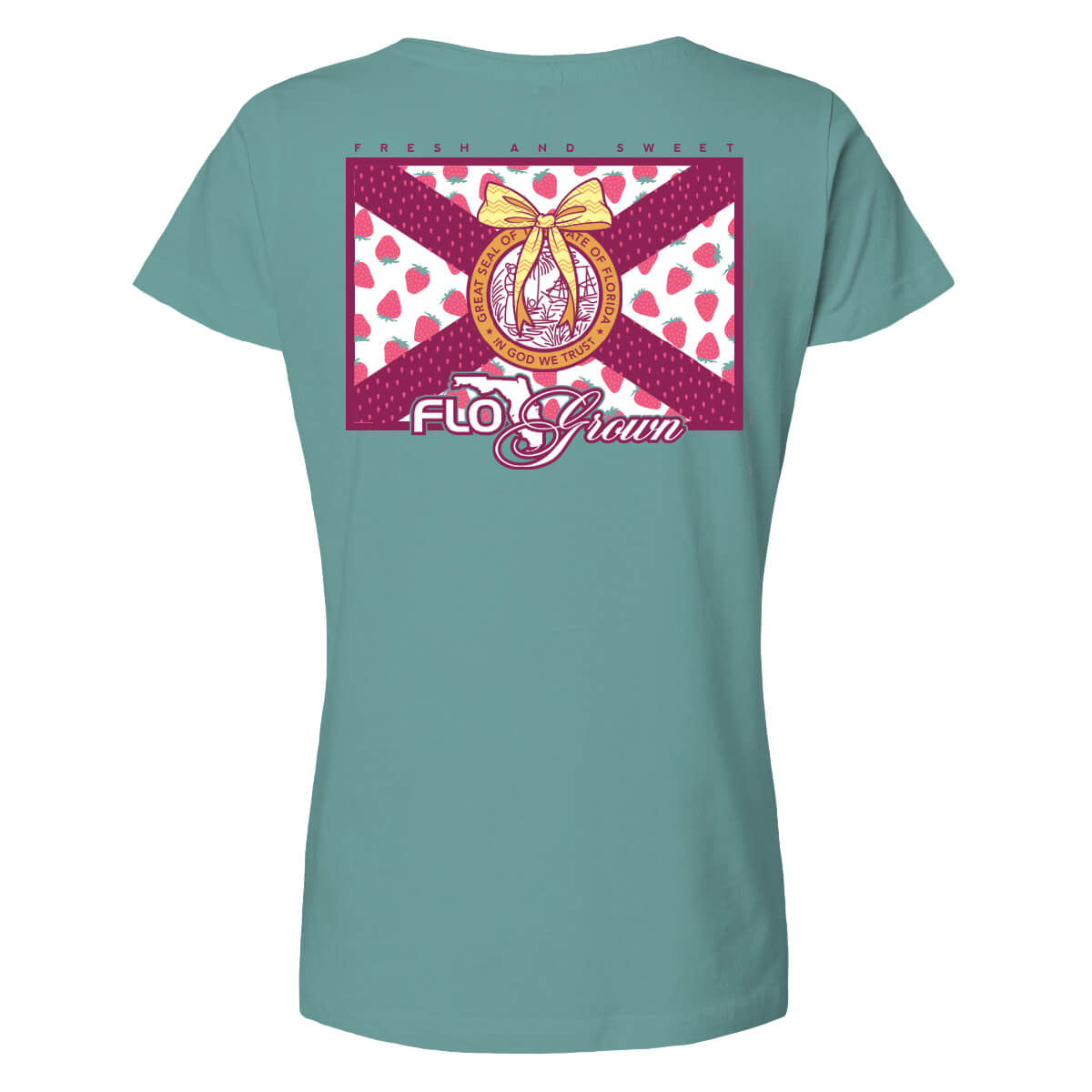 Blue women's tee with a graphic of the Florida flag on the back with strawberries within it and a bow on the Florida seal.