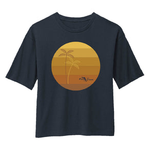 Navy tee with a geometric graphic of a sunset and palm trees on the front with the FloGrown logo.