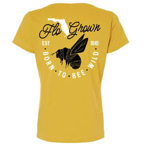 Yellow women's t-shirt with bee graphic and text 'BORN TO BEE WILD' on the back.