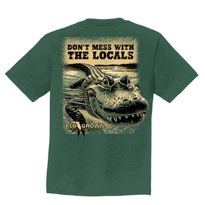 Green youth tee with a graphic of a Gator in the water with text 'DON'T MESS WITH THE LOCALS'.