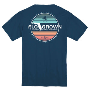 Navy blue t-shirt with 'FLO GROWN' graphic on the back with lines indicating a sunset.
