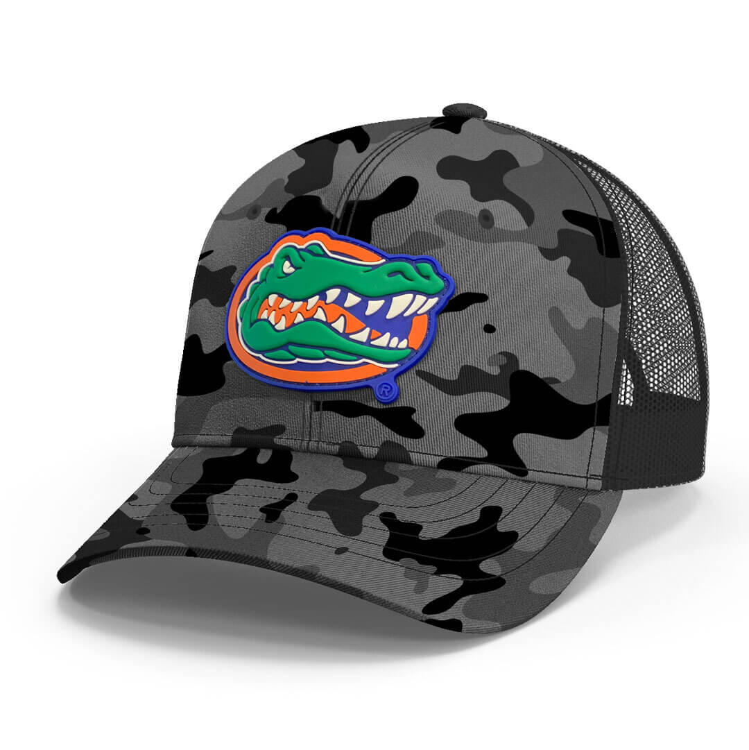 Black camouflage baseball cap with Florida Gators logo in full color on the crown.
