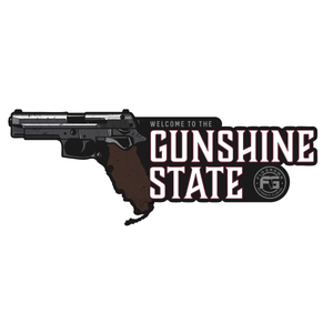 A decal with a handgun as the state of Florida and text 'WELCOME TO THE GUNSHINE STATE'.