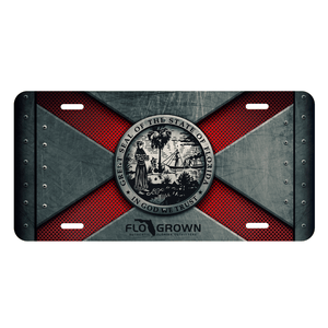 A metal license plate with a sublimated design featuring red and gray colors and the flag of Florida.