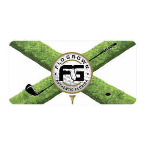 White license plate with an X representing the Florida flag in a design of golf greens and the Florida seal replaced with a golf ball. 