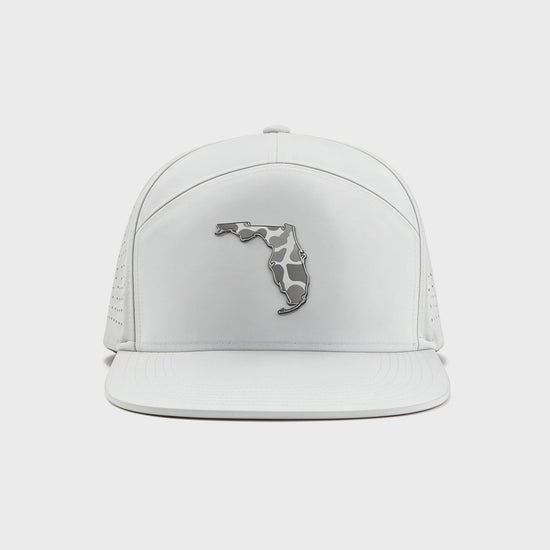 White hat with a state of Florida badge with gray and white camo within it. Perforated white backing.