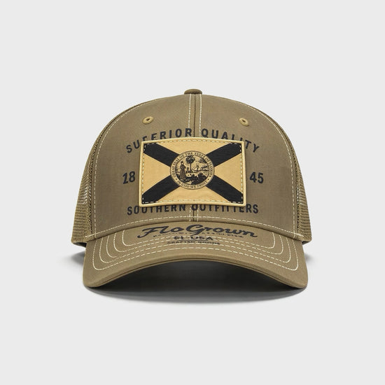 Video showing 180 degree view of the tan hat with a Florida flag patch and trucker mesh backing.