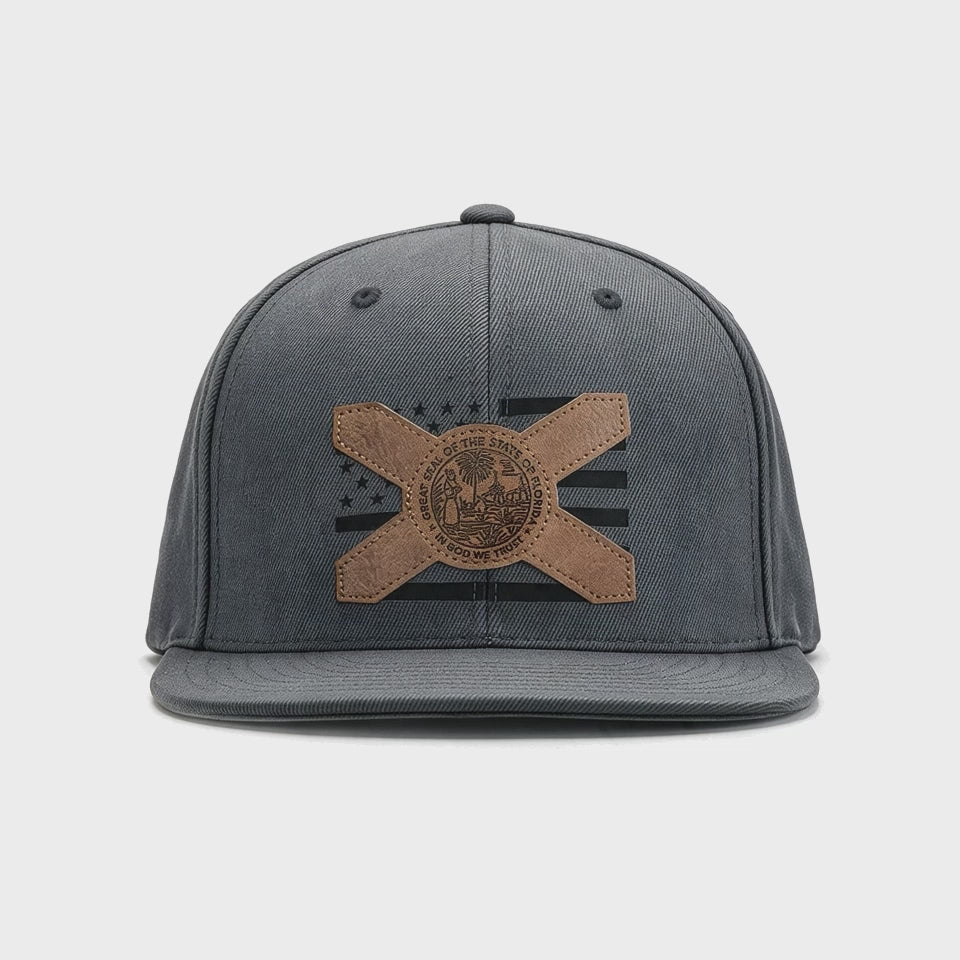 Video showing 180 view of the gray hat with American flag and Florida flag patch with flat brim and snapback.
