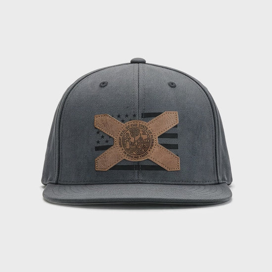 Video showing 180 view of the gray hat with American flag and Florida flag patch with flat brim and snapback.