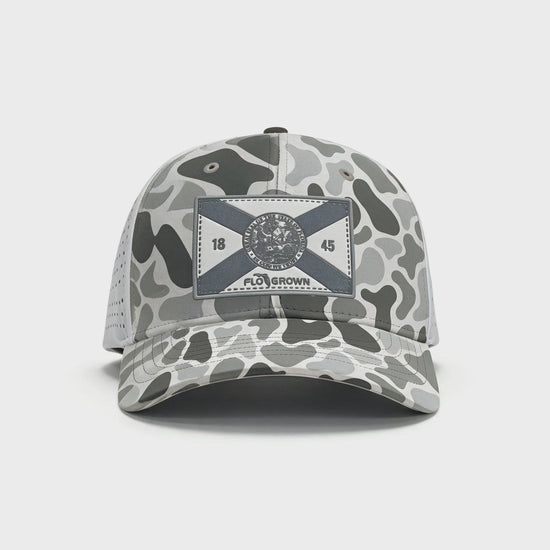 Video of a 180 view of the hat showing the gray camo front with Florida flag patch and the perforated backing.